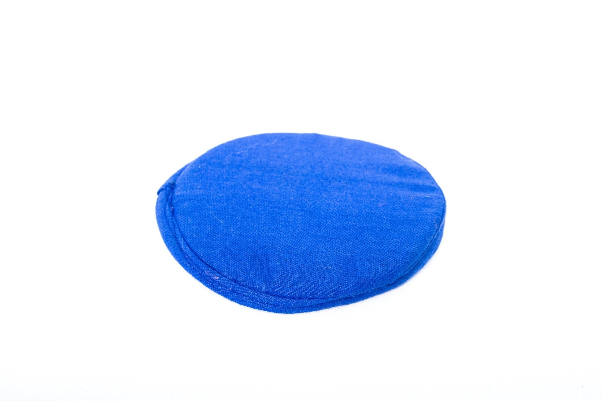 Flat singing bowl cushion in blue