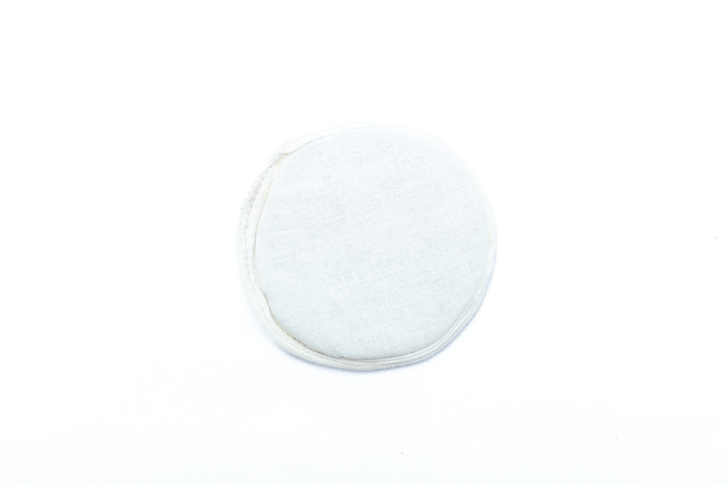 Flat singing bowl cushion in white