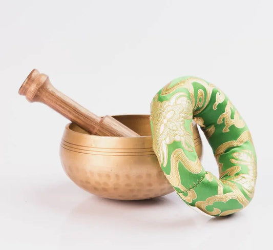 Hand - beaten brass singing bowl