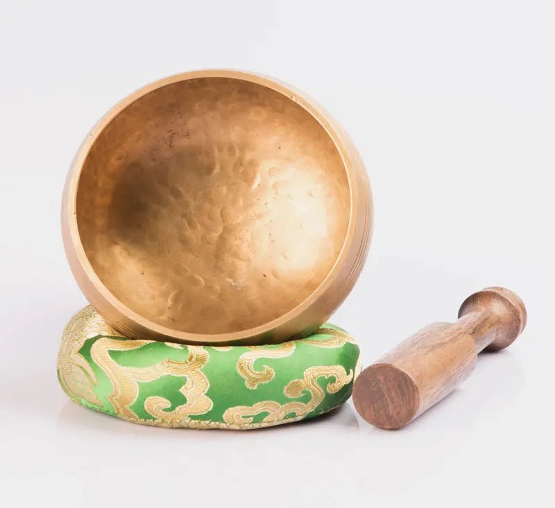 Hand - beaten brass singing bowl