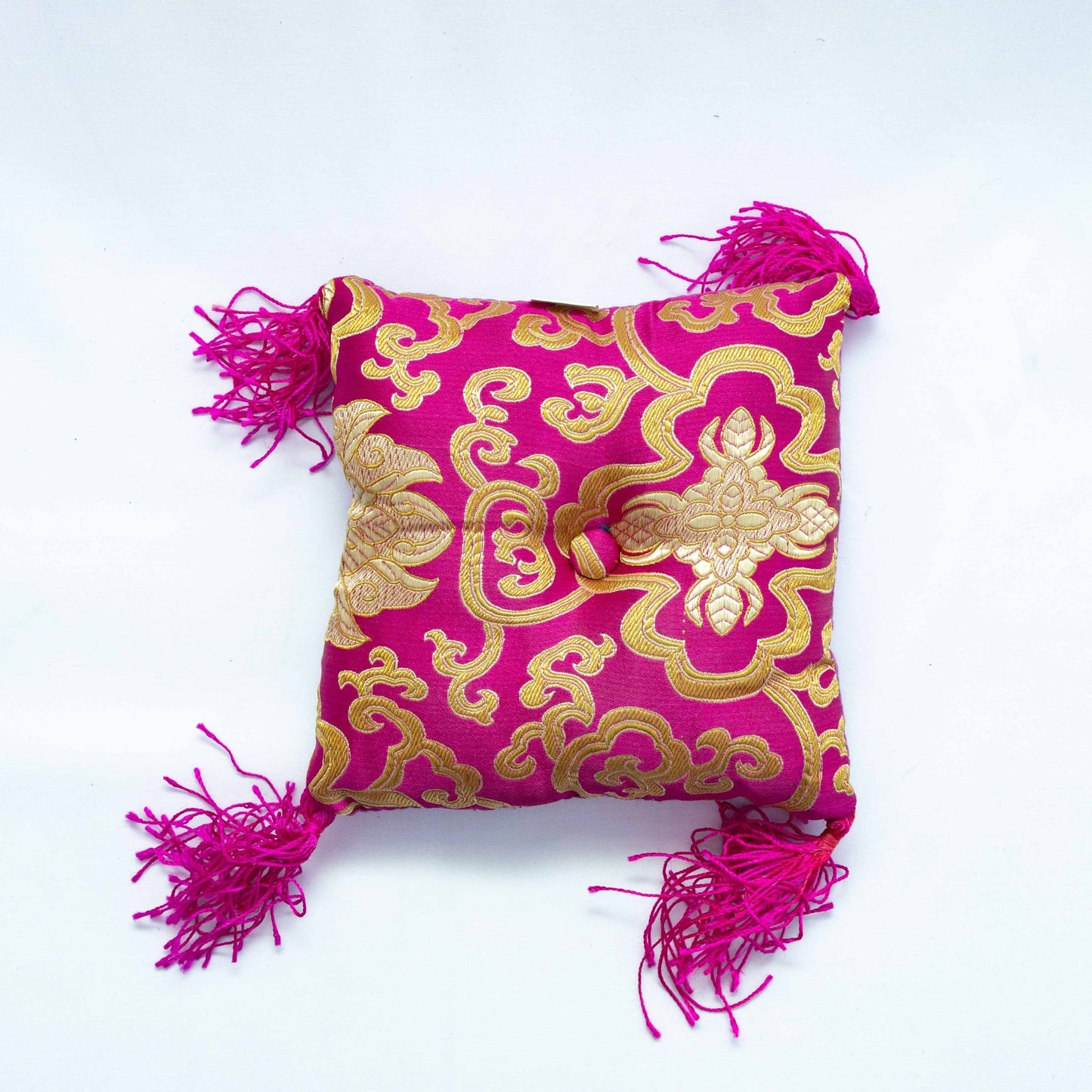 Square singing bowl cushion in pink
