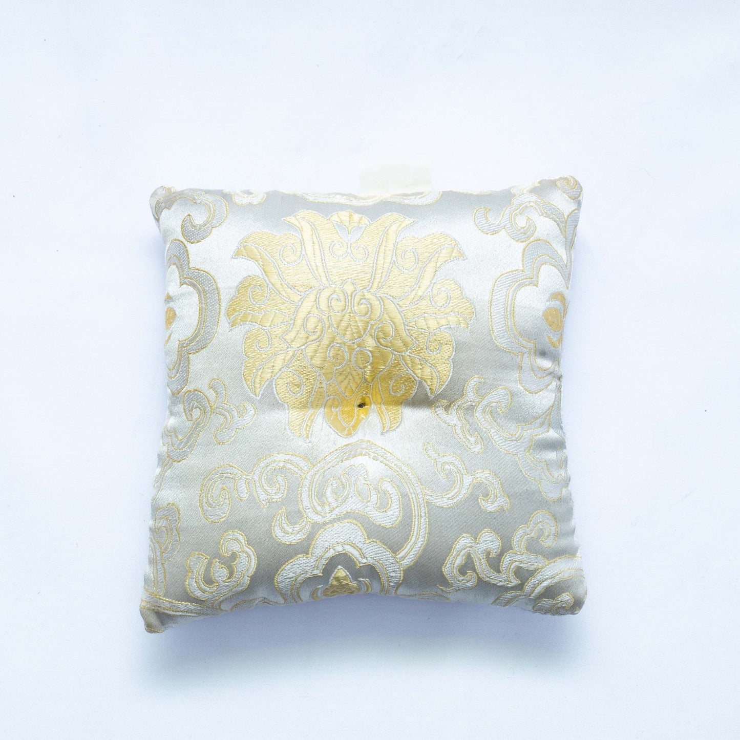 Square singing bowl cushion in white
