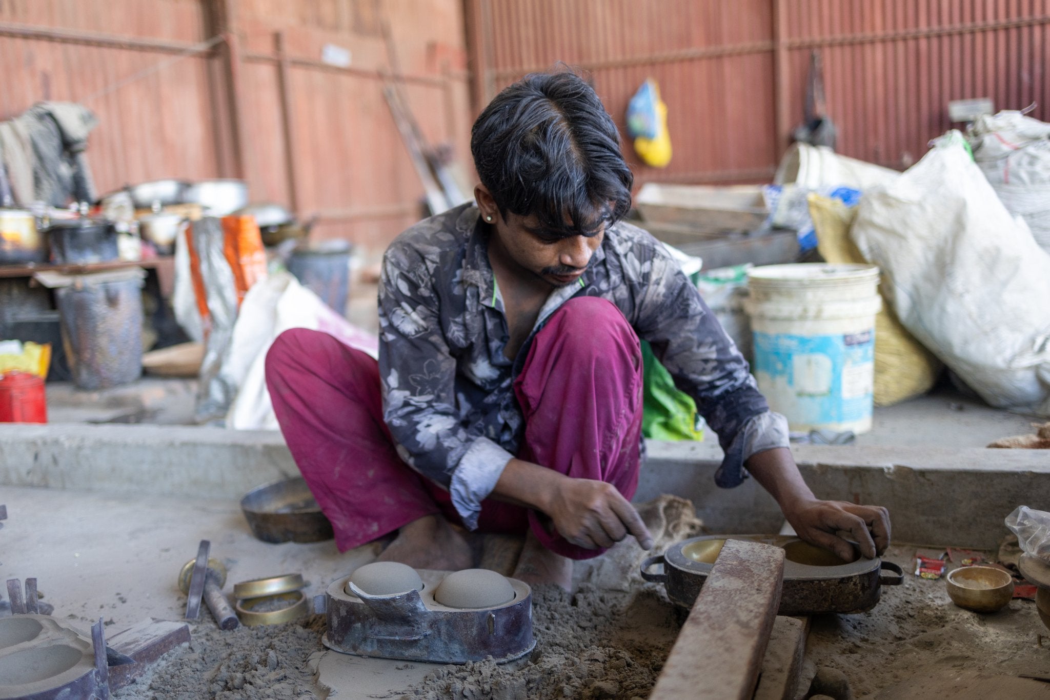 artisan creating singing bowl